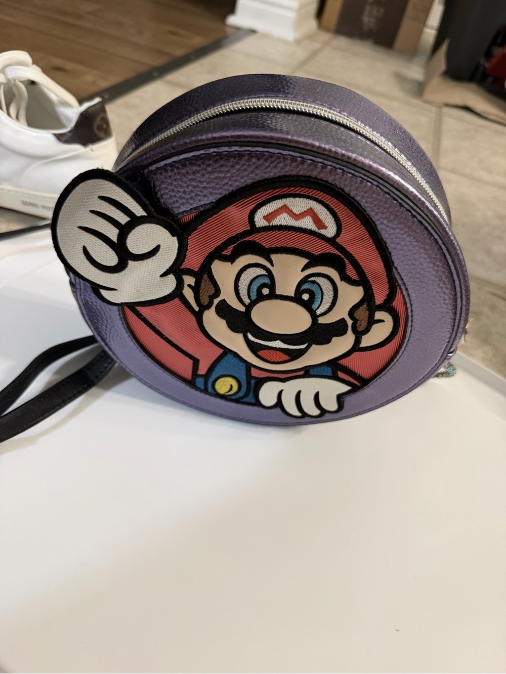Danielle Nicole White Label with Black Super Mario Logo